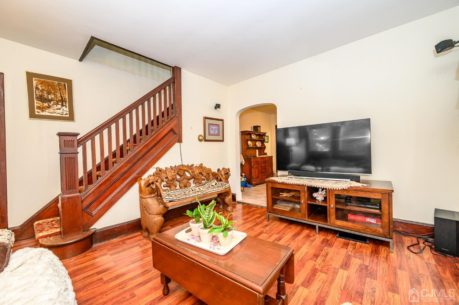 1860 Pennington Road Ewing, NJ 08638 - Photo 8 of 35 a living room with furniture and a flat screen tv