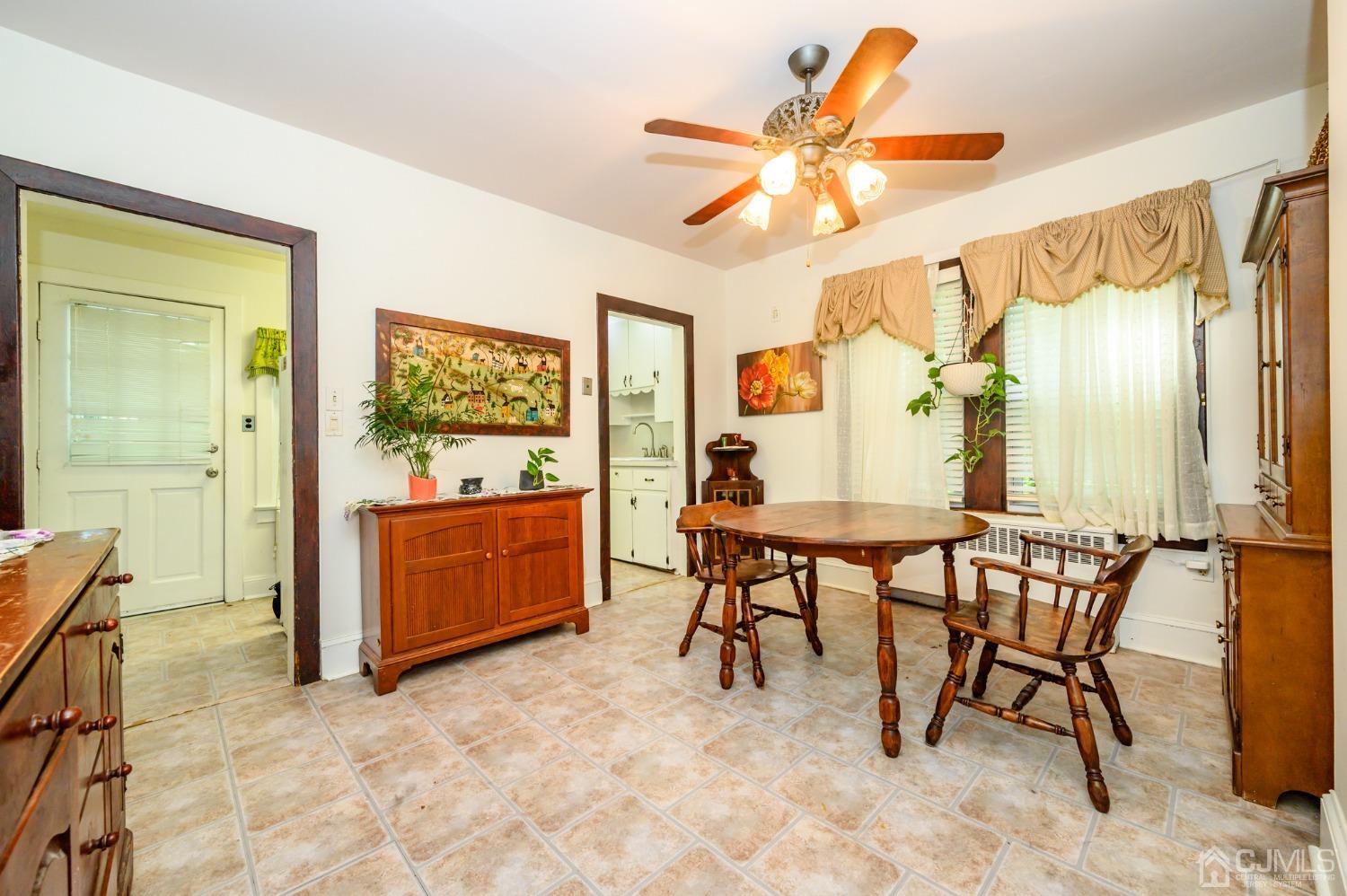 1860 Pennington Road Ewing, NJ 08638 - Photo 9 of 35 a view of a dining room with furniture and a window
