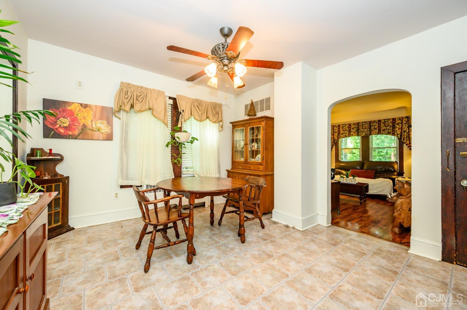 1860 Pennington Road Ewing, NJ 08638 - Photo 10 of 35 a view of a dining room with furniture and a rug