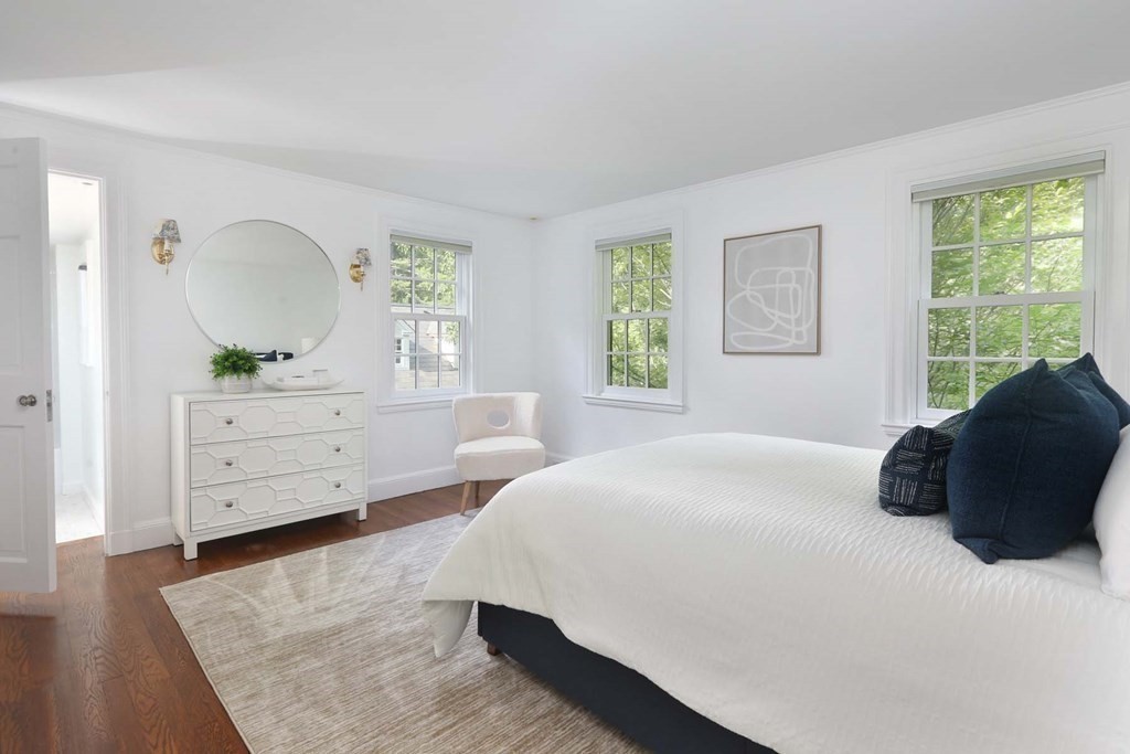 11 Laurel Road Brookline, MA 02467 - Photo 13 of 24 a bedroom with a bed and a dresser