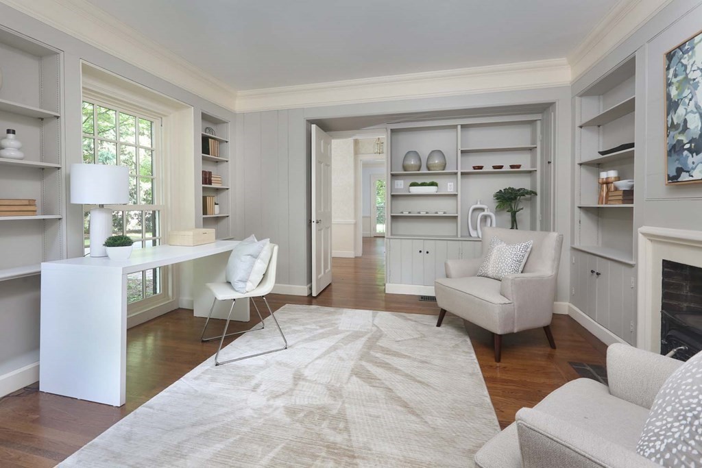 11 Laurel Road Brookline, MA 02467 - Photo 8 of 24 a living room with furniture and a large window