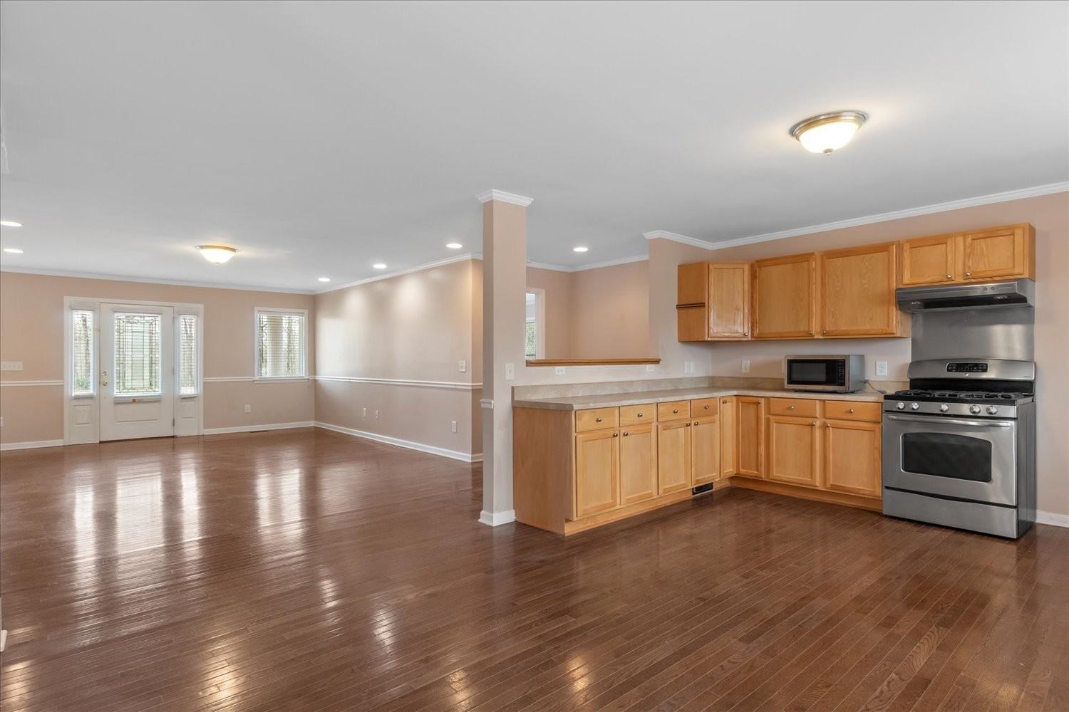 732 Tiger Bennett Road Hampshire, TN 38461 - Photo 18 of 35 a large kitchen with granite countertop a large counter top stainless steel appliances and cabinets