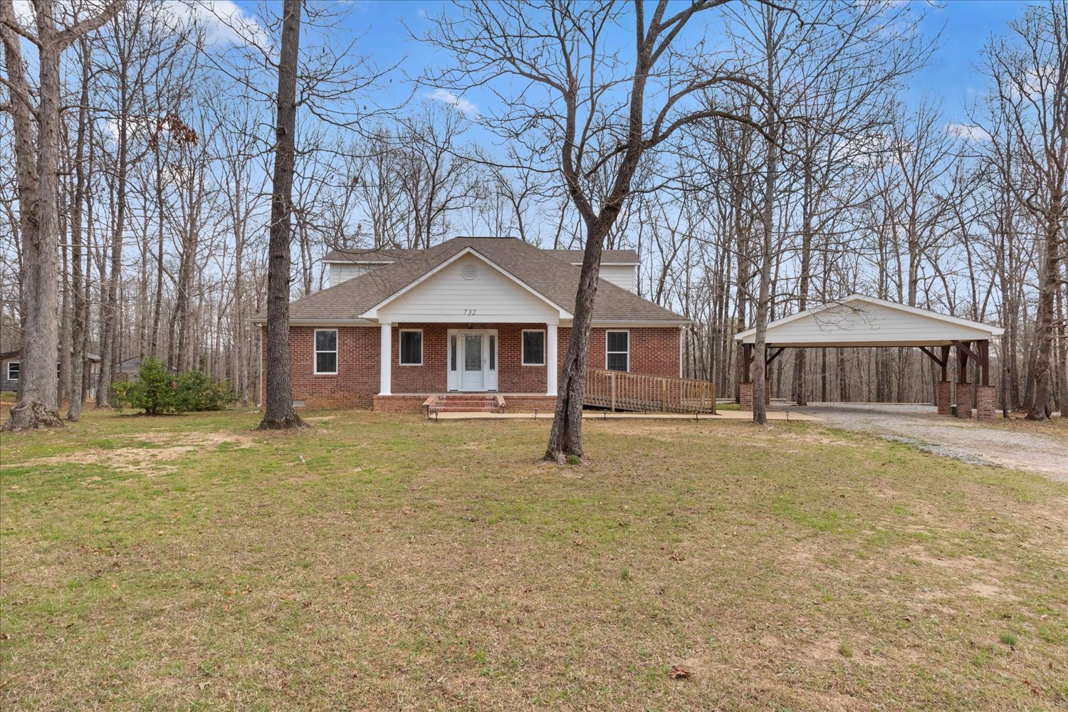 732 Tiger Bennett Road Hampshire, TN 38461 - Photo 2 of 35 a front view of a house with yard and tree