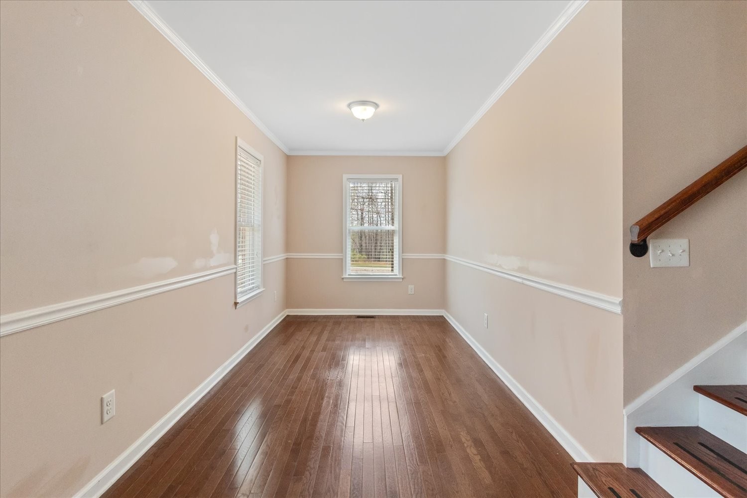 732 Tiger Bennett Road Hampshire, TN 38461 - Photo 21 of 35 a view of an empty room with wooden floor and a window