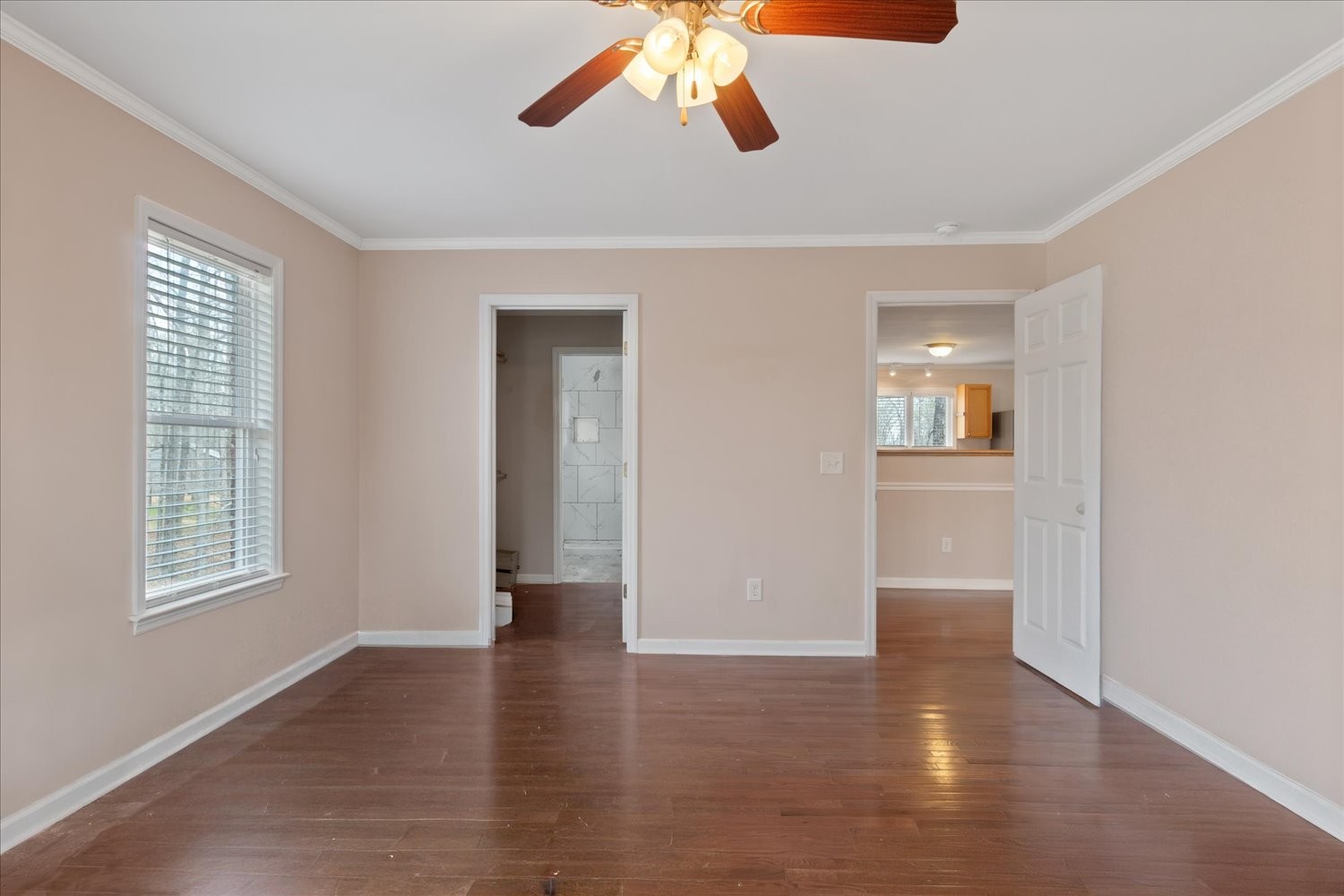 732 Tiger Bennett Road Hampshire, TN 38461 - Photo 24 of 35 a view of an empty room with a window and wooden floor