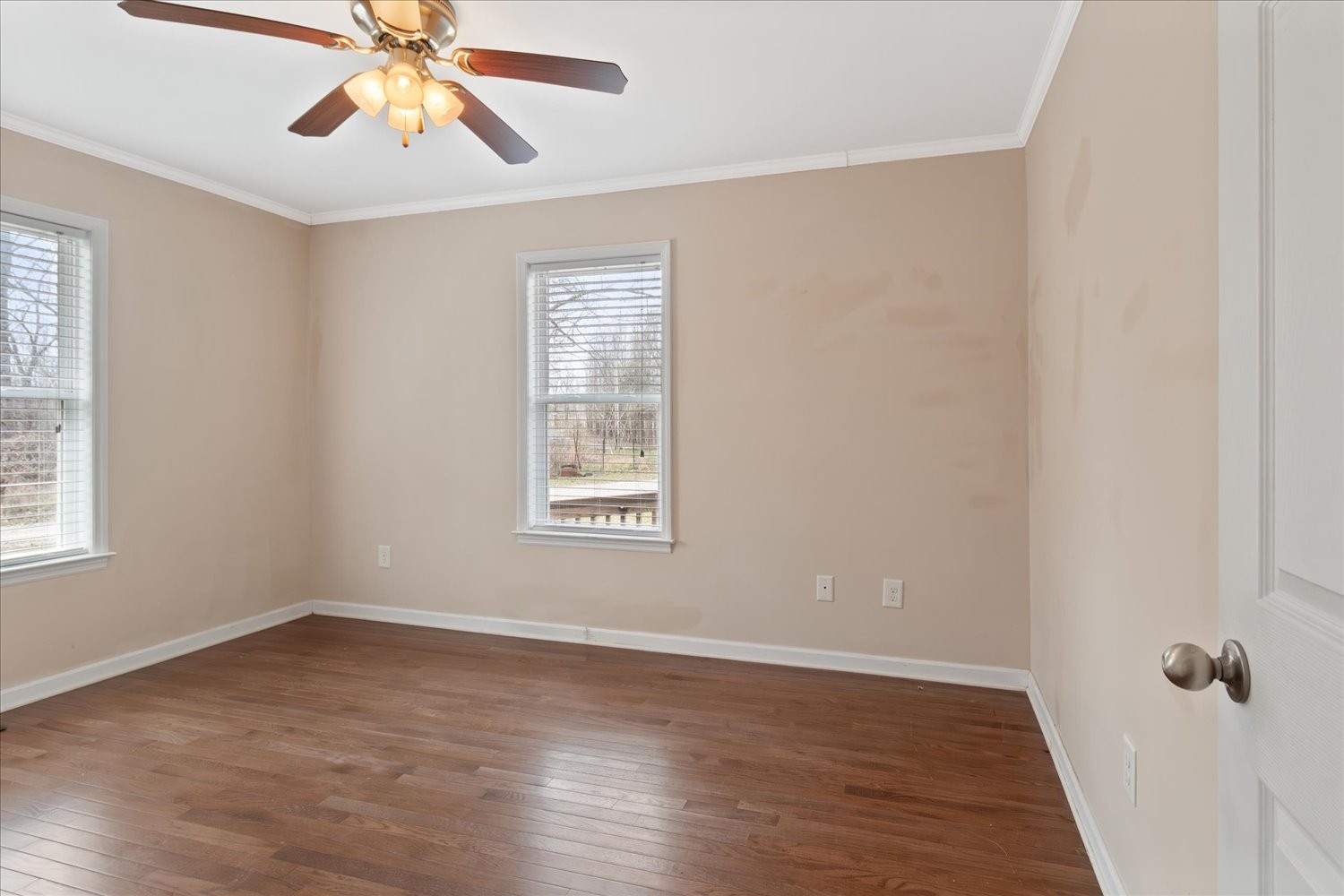 732 Tiger Bennett Road Hampshire, TN 38461 - Photo 25 of 35 a view of an empty room with a window and wooden floor