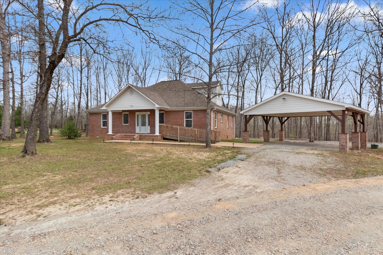 732 Tiger Bennett Road Hampshire, TN 38461 - Photo 4 of 35 a front view of a house with a yard and garage