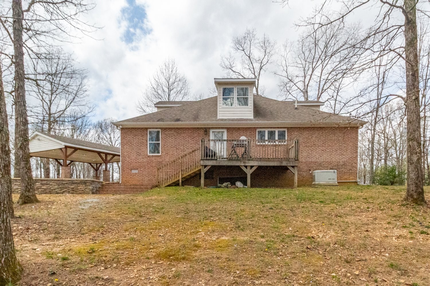 732 Tiger Bennett Road Hampshire, TN 38461 - Photo 8 of 35 a view of a house with a yard and large tree