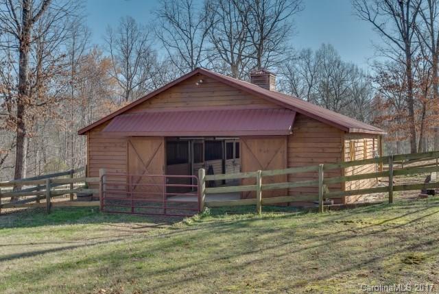 322 Pleasant Hill Road Landrum, SC 29356 - Photo 18 of 23 a front view of a house with a yard