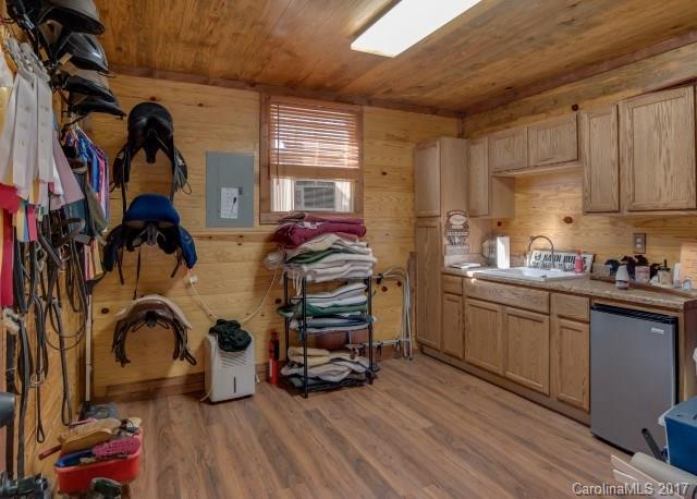 322 Pleasant Hill Road Landrum, SC 29356 - Photo 20 of 23 a view of walk in closet with clothes and shoes