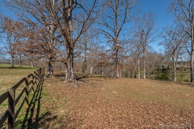 322 Pleasant Hill Road Landrum, SC 29356 - Photo 23 of 23 a view of a yard with wooden fence