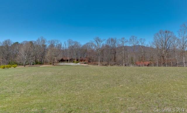 322 Pleasant Hill Road Landrum, SC 29356 - Photo 4 of 23 a view of a field with trees in the background