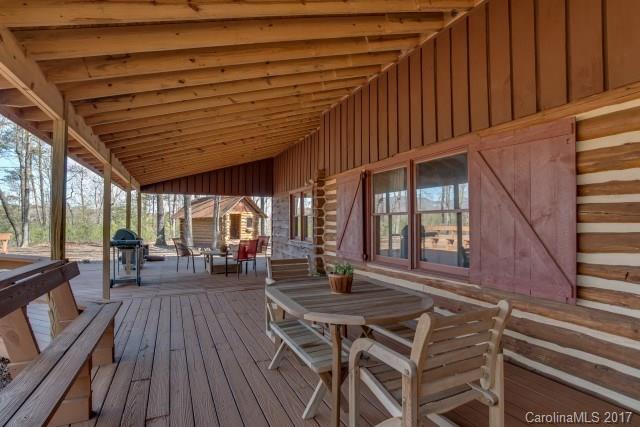 322 Pleasant Hill Road Landrum, SC 29356 - Photo 6 of 23 a view of a patio with table and chairs