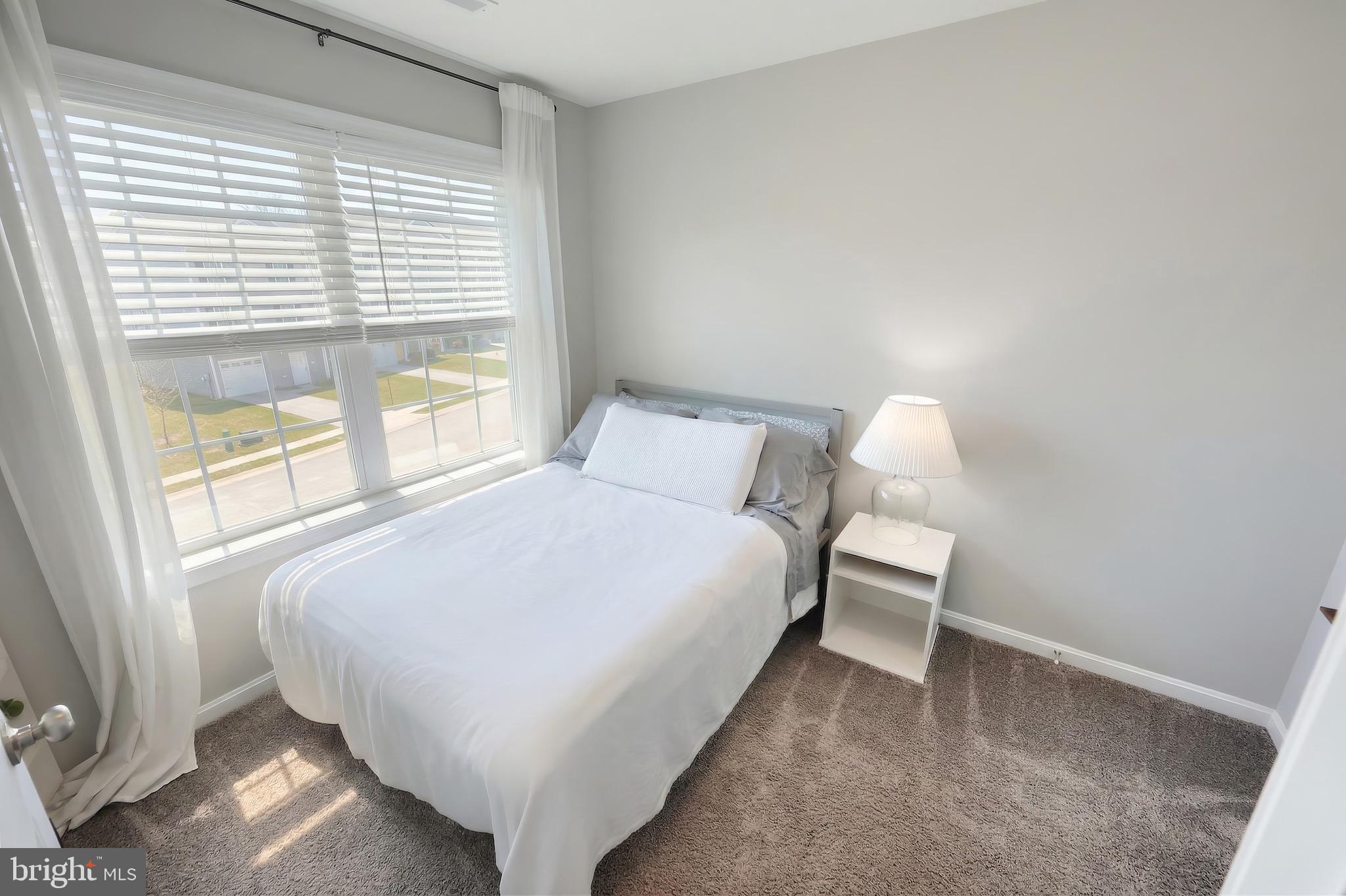 54 Coop Lane Hanover, PA 17331 - Photo 23 of 34 a bed sitting in a bedroom next to a window