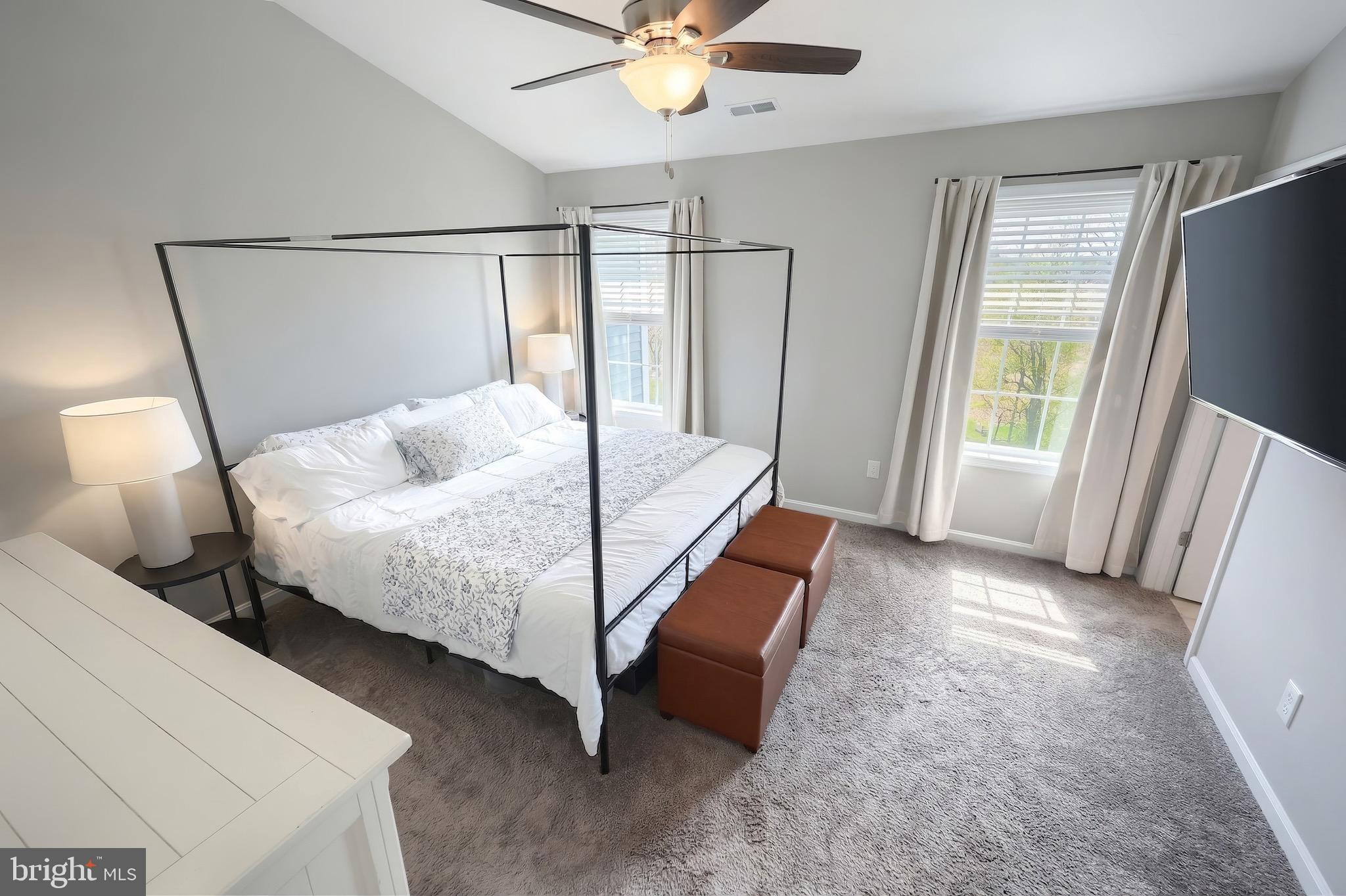 54 Coop Lane Hanover, PA 17331 - Photo 25 of 34 a bedroom with a bed and a large mirror