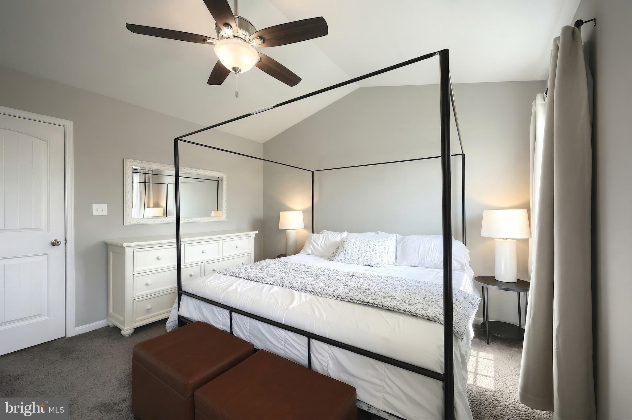 54 Coop Lane Hanover, PA 17331 - Photo 26 of 34 a bedroom with a bed and a chandelier