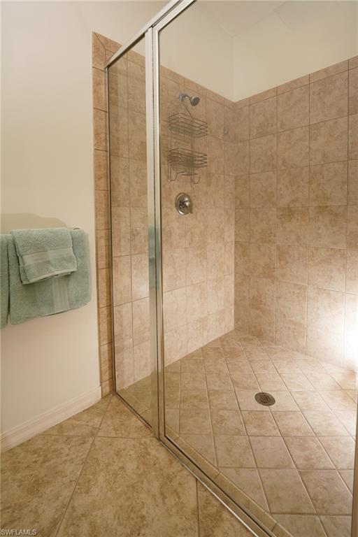 8986 Cambria Circle, Unit 22 Naples, FL 34113 - Photo 12 of 20 Bathroom with walk in shower