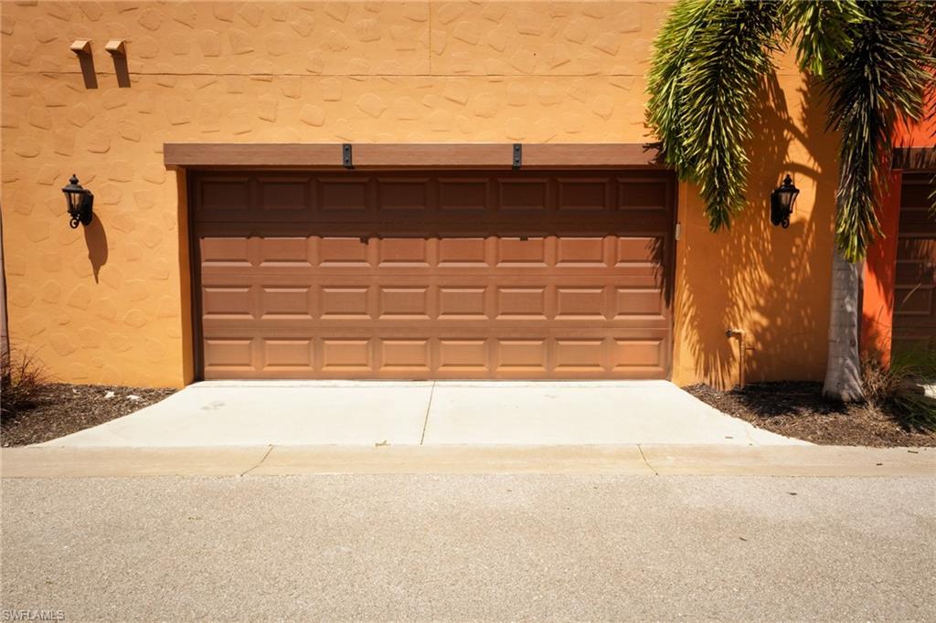 8986 Cambria Circle, Unit 22 Naples, FL 34113 - Photo 19 of 20 View of garage