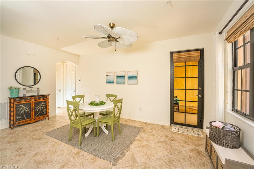 8986 Cambria Circle, Unit 22 Naples, FL 34113 - Photo 6 of 20 Tiled dining room featuring ceiling fan