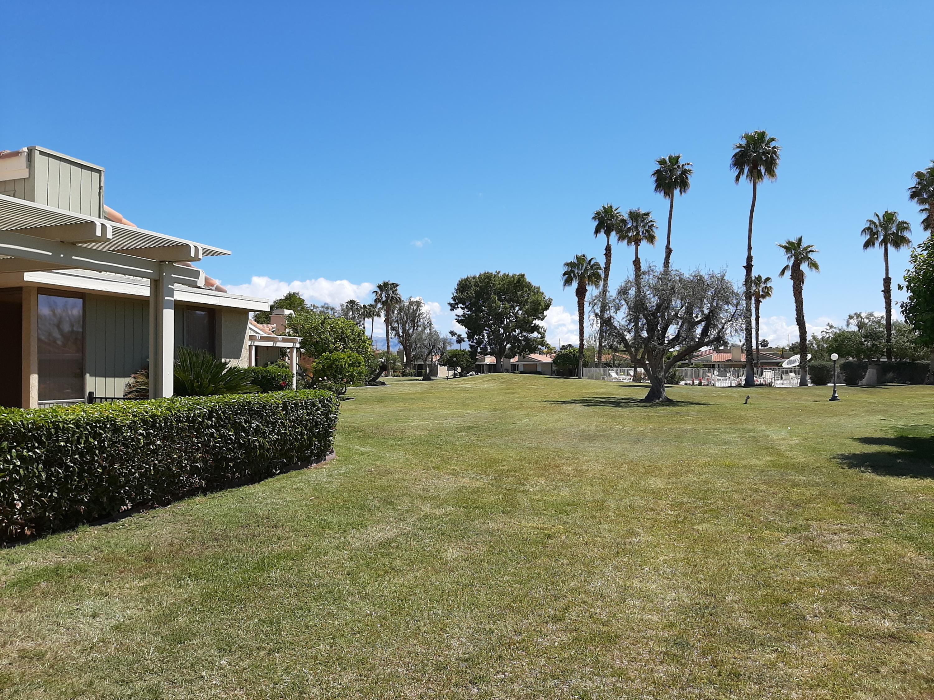72385 Beverly Way Rancho Mirage, CA 92270 - Photo 12 of 24 a view of a house with a yard