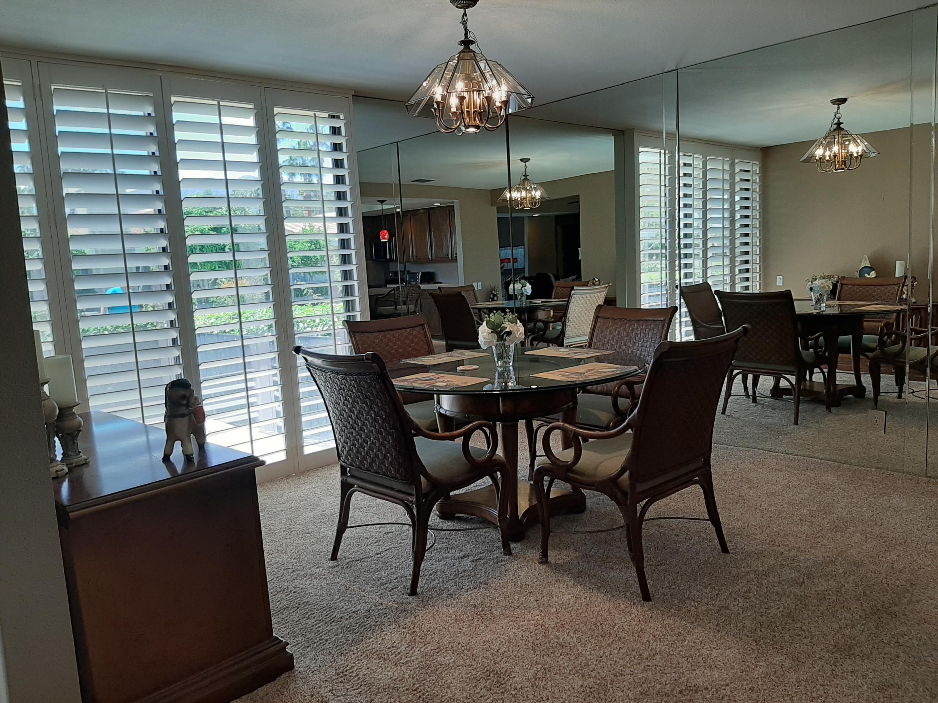 72385 Beverly Way Rancho Mirage, CA 92270 - Photo 18 of 24 a view of a dining room with furniture window and outside view