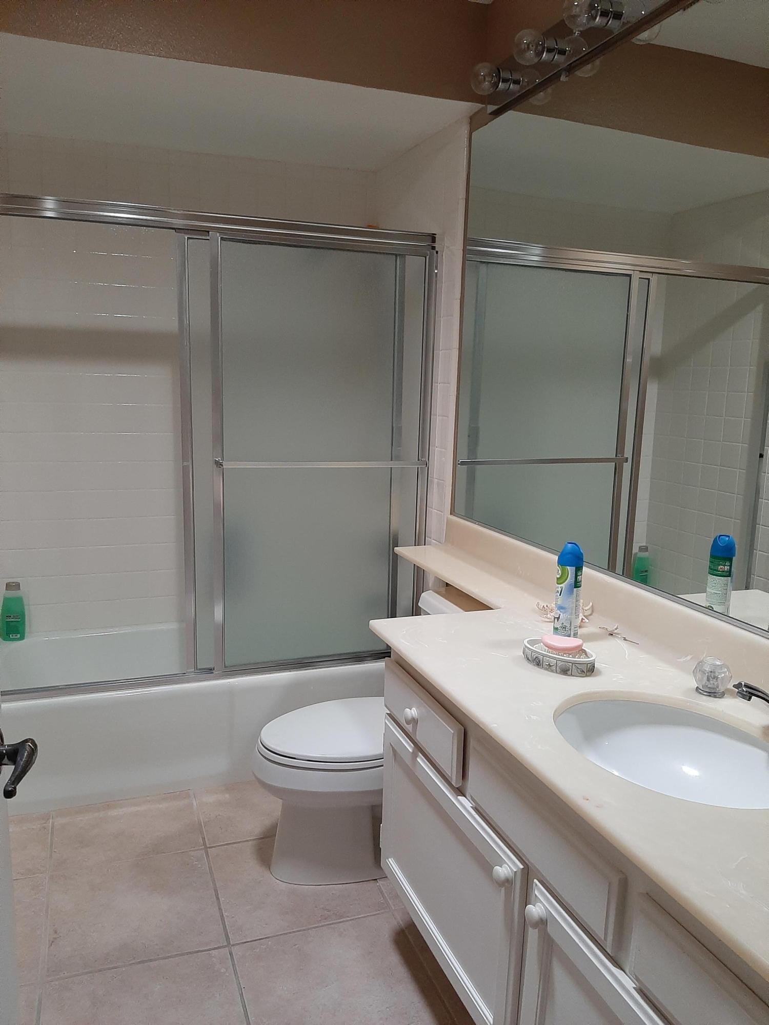 72385 Beverly Way Rancho Mirage, CA 92270 - Photo 23 of 24 a bathroom with a sink a toilet and shower