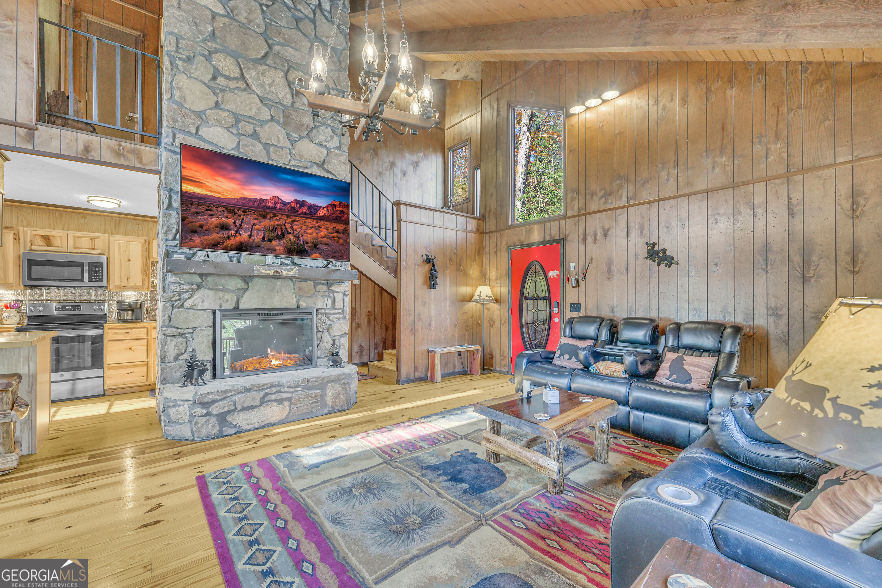 243 Ridge Road Helen, GA 30545 - Photo 12 of 82 a living room with furniture and a fireplace