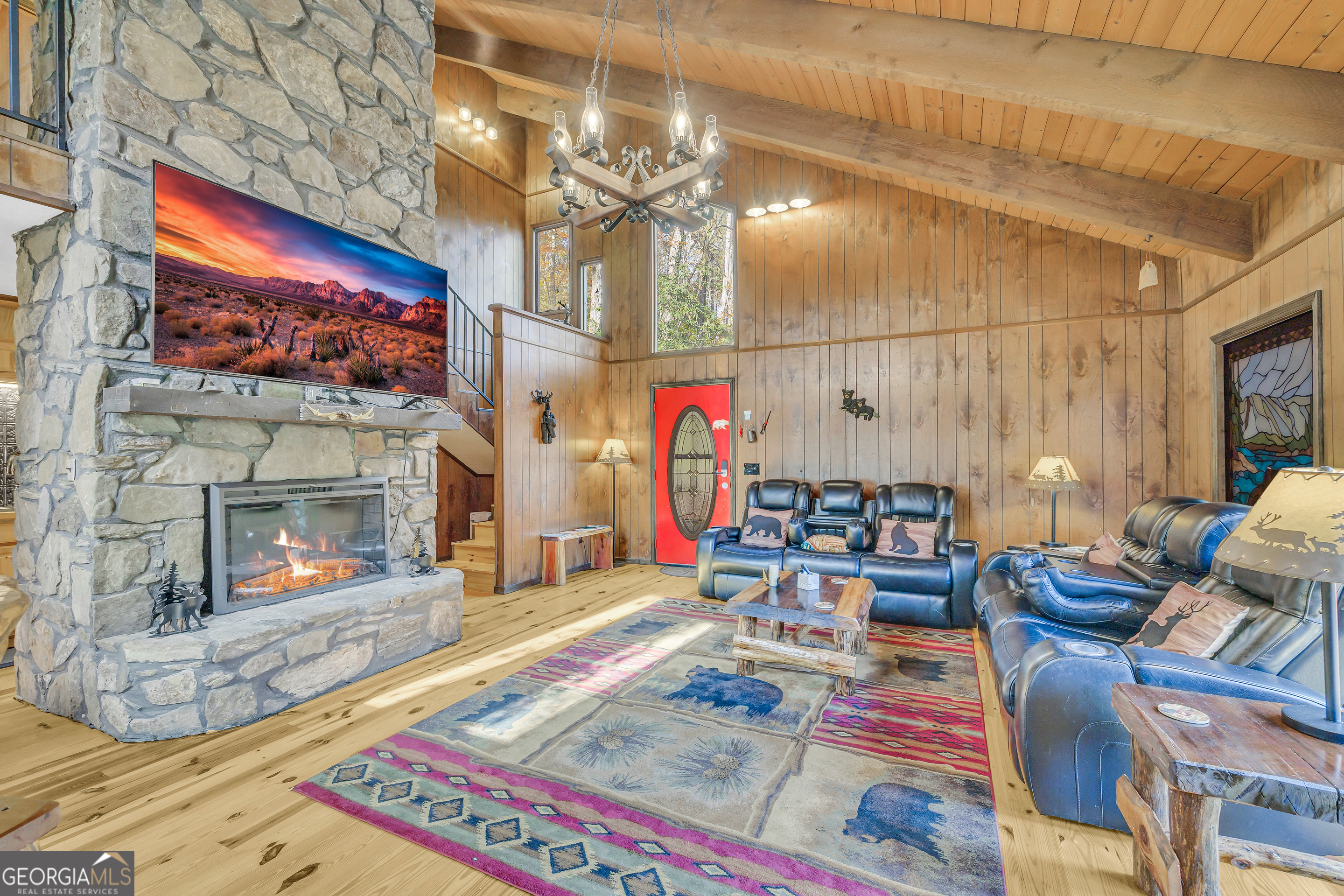 243 Ridge Road Helen, GA 30545 - Photo 17 of 82 a living room with furniture and a fireplace