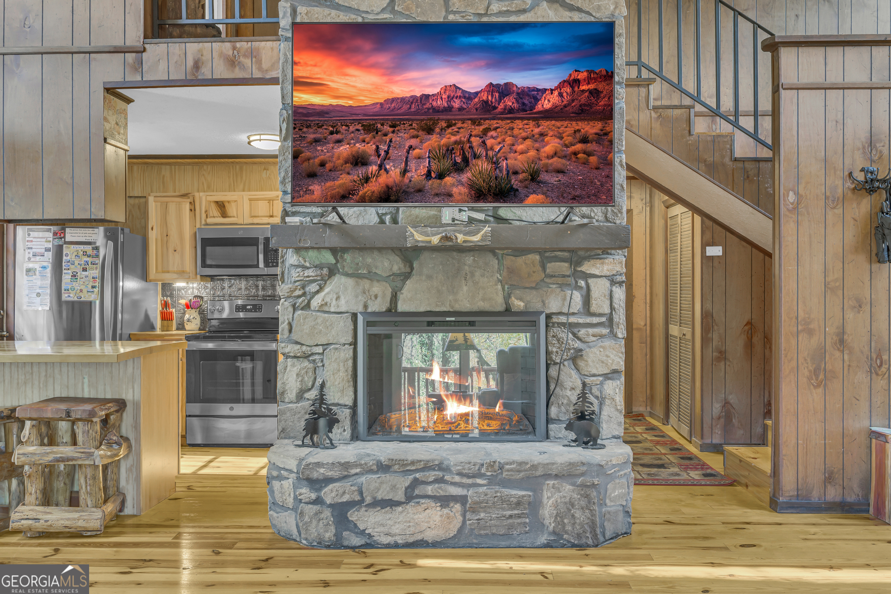 243 Ridge Road Helen, GA 30545 - Photo 19 of 82 a living room with fireplace furniture and a fireplace