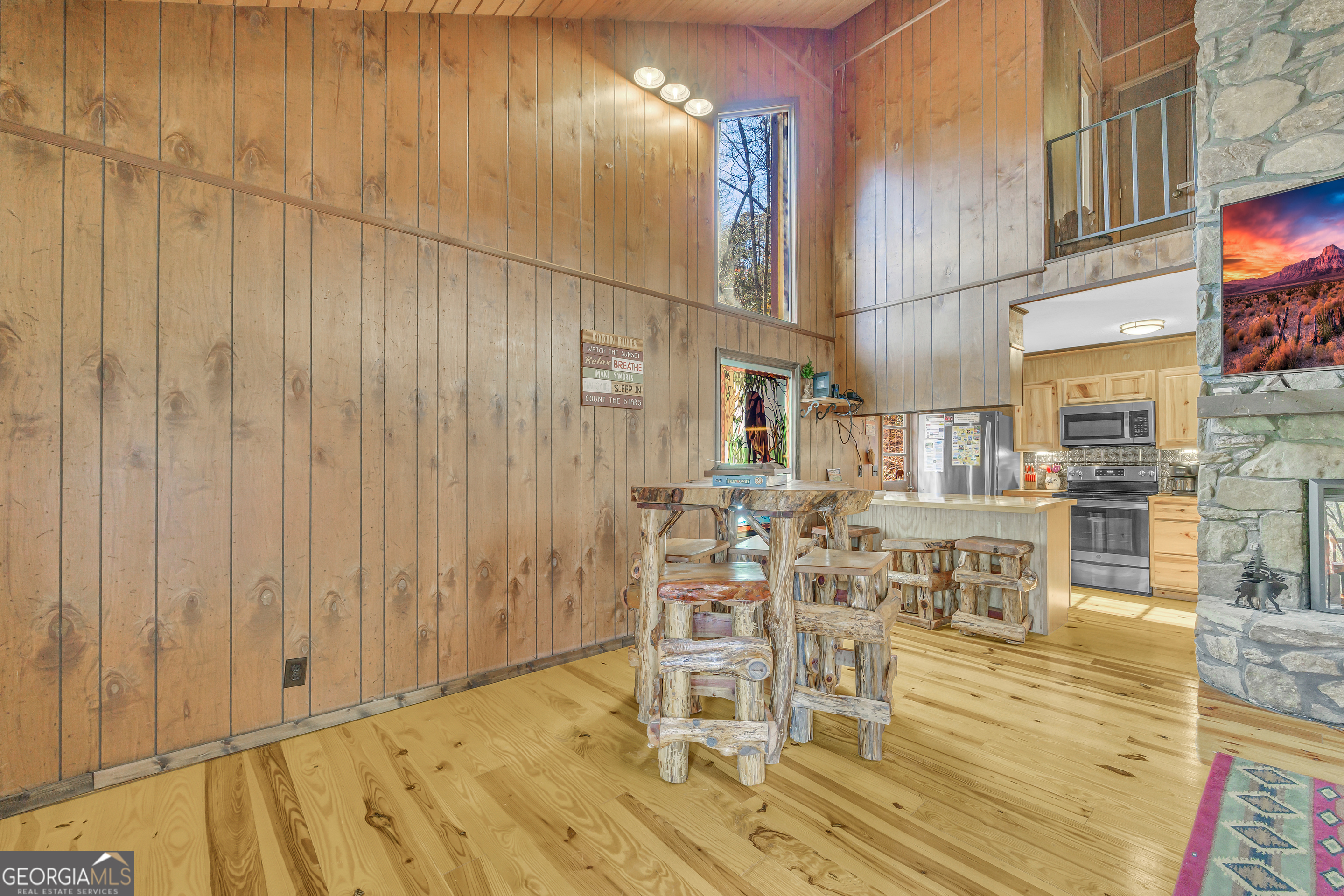243 Ridge Road Helen, GA 30545 - Photo 21 of 82 a view of a dining room with furniture and wooden floor