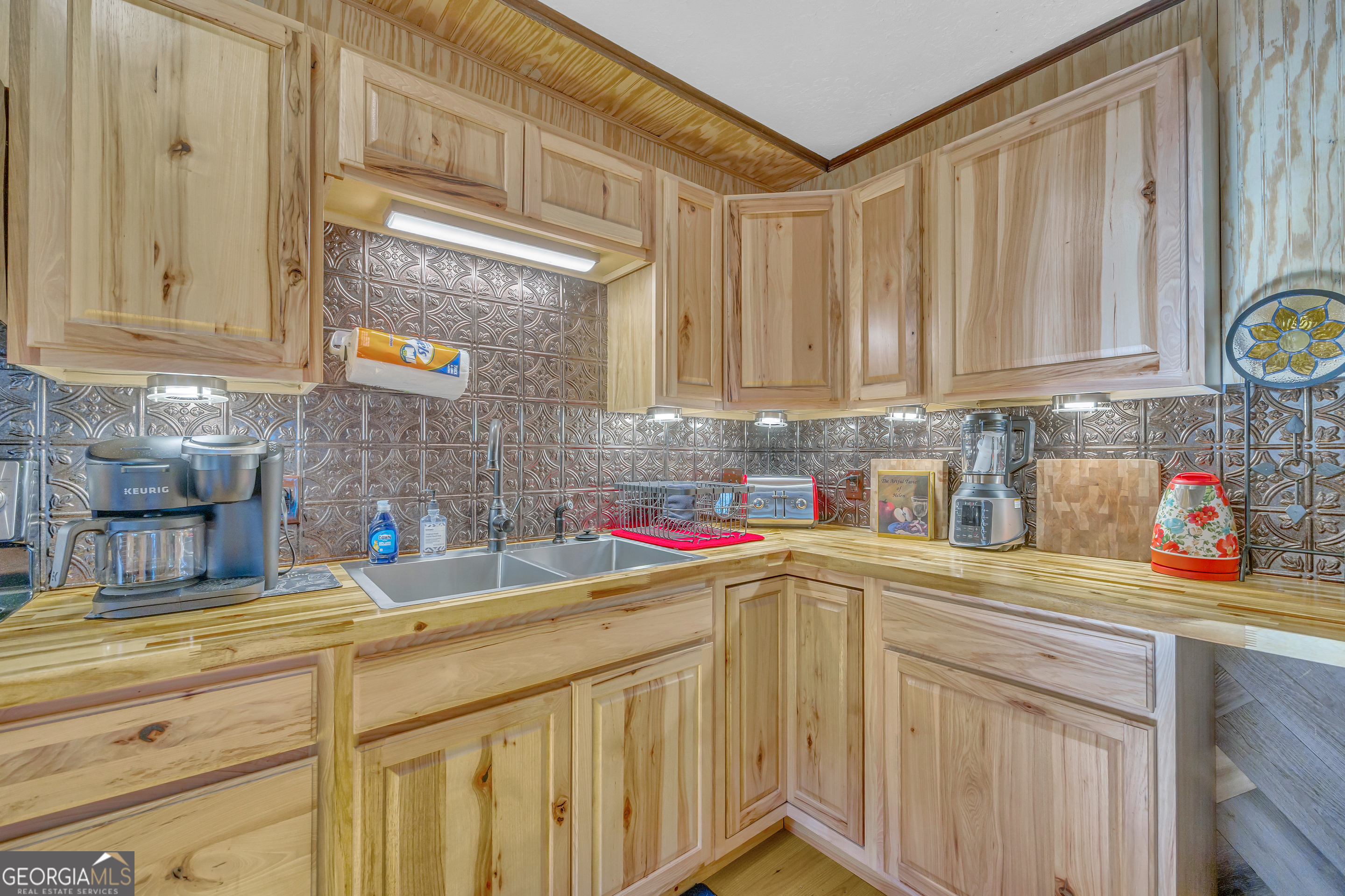 243 Ridge Road Helen, GA 30545 - Photo 25 of 82 a kitchen with stainless steel appliances granite countertop a sink and cabinets