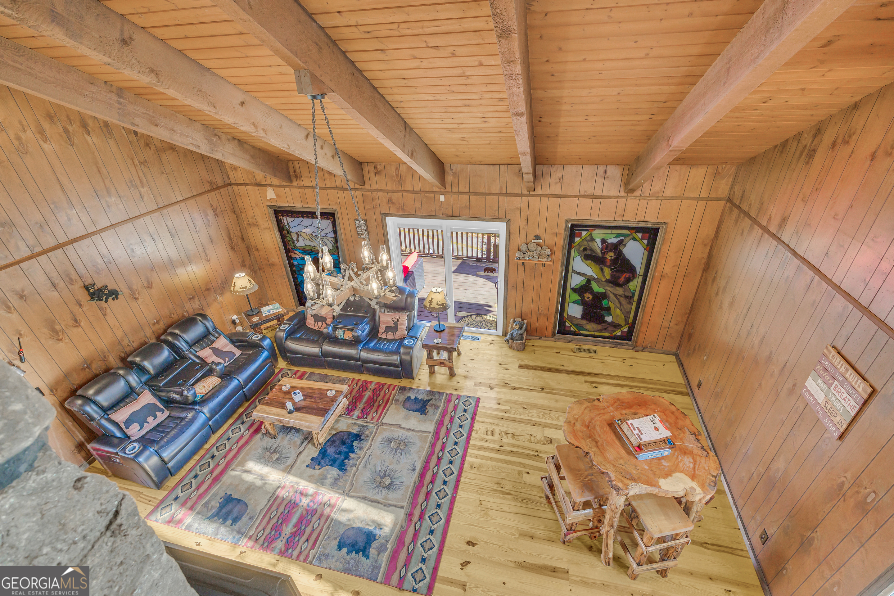 243 Ridge Road Helen, GA 30545 - Photo 37 of 82 a living room with couch and a dining table
