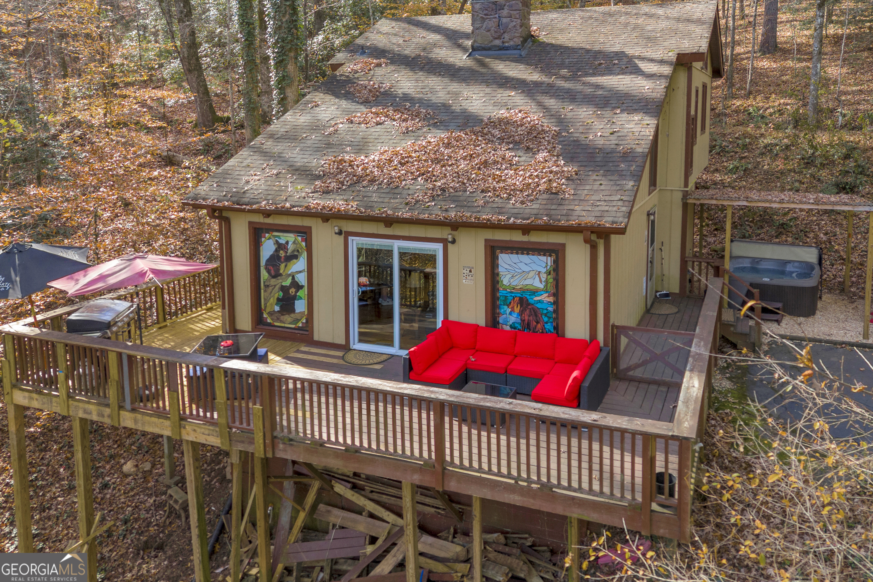 243 Ridge Road Helen, GA 30545 - Photo 48 of 82 a view of a house with a porch