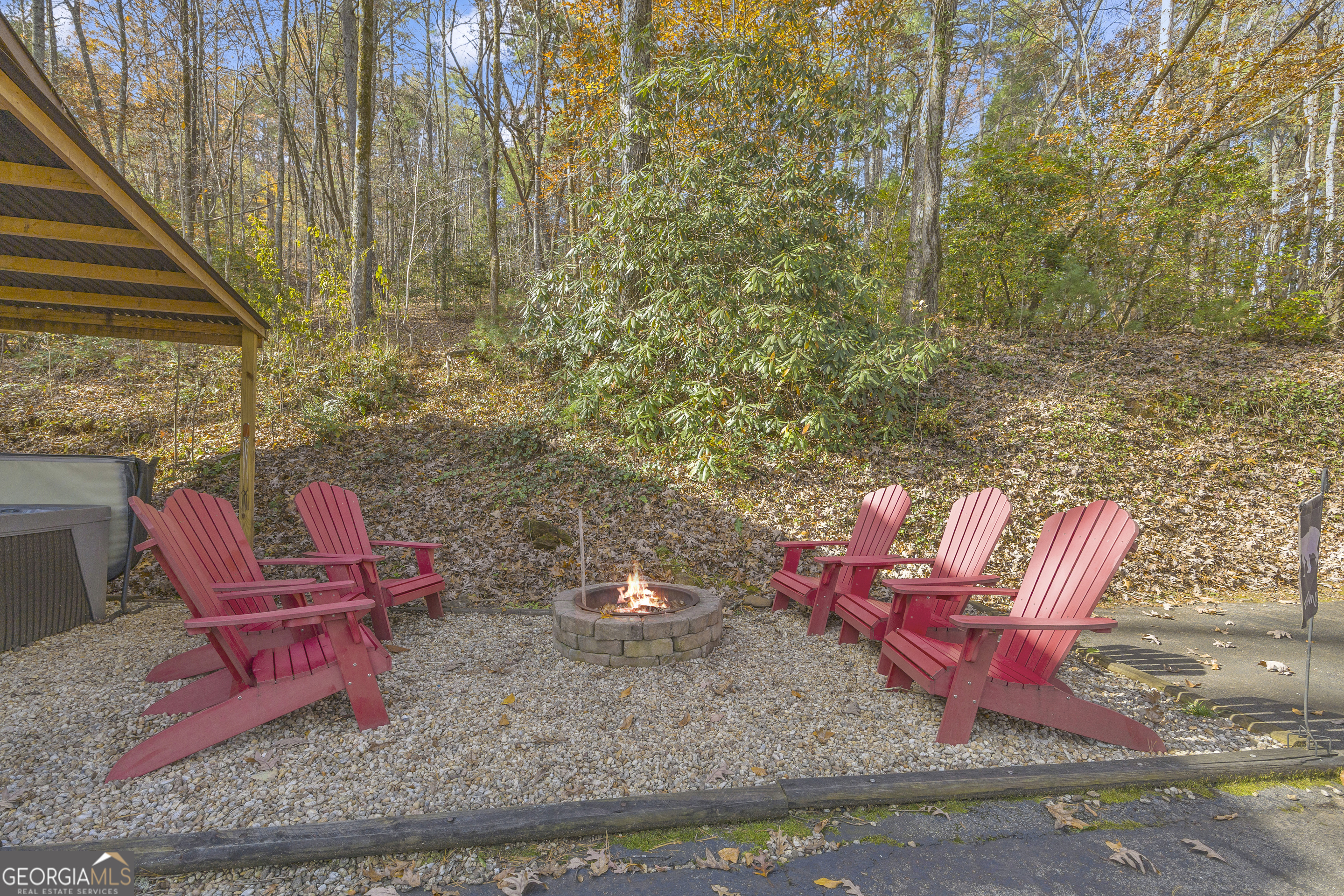 243 Ridge Road Helen, GA 30545 - Photo 51 of 82 a view of a backyard with table and chairs