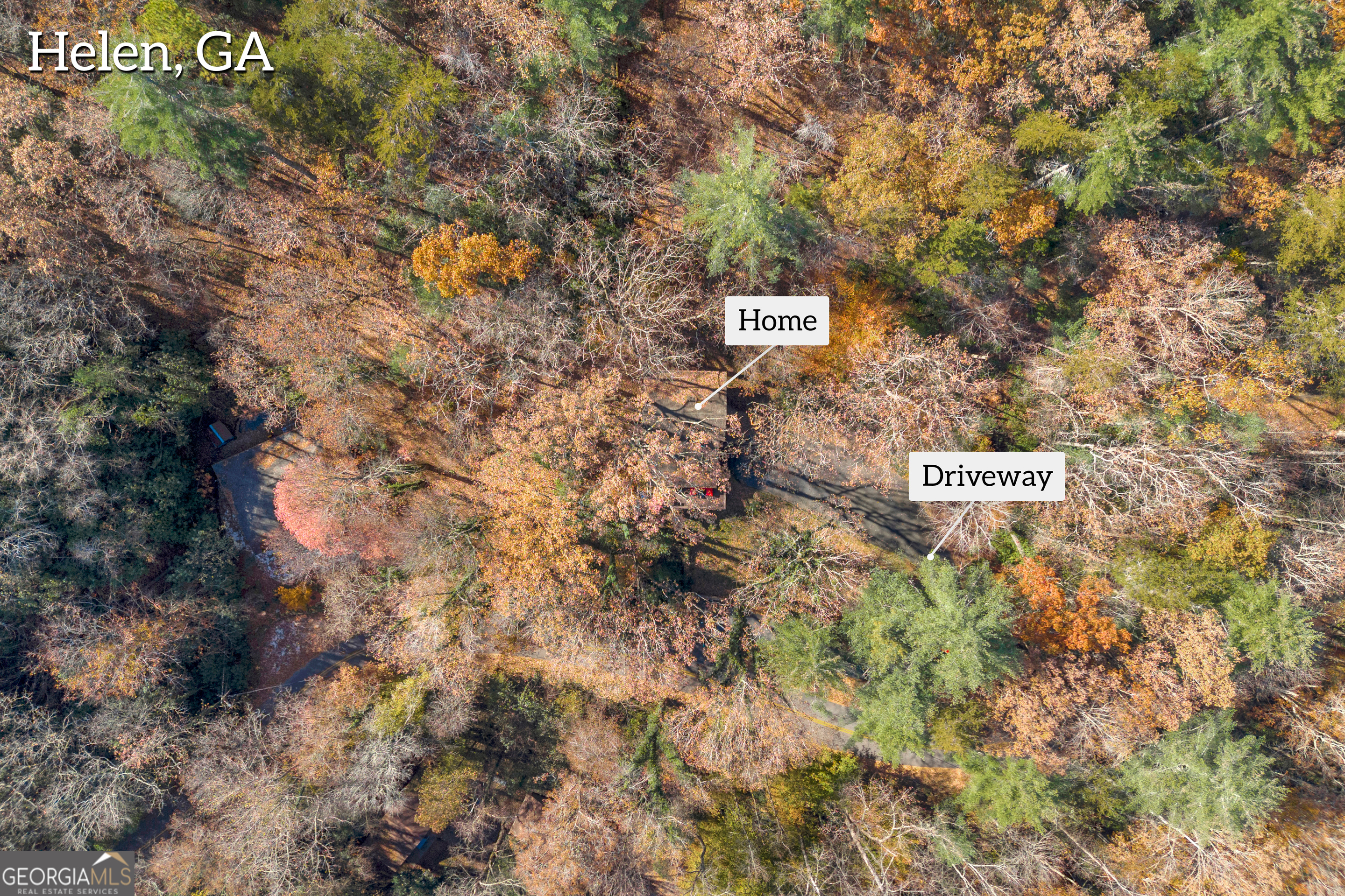 243 Ridge Road Helen, GA 30545 - Photo 62 of 82 a sign that is on a brick wall