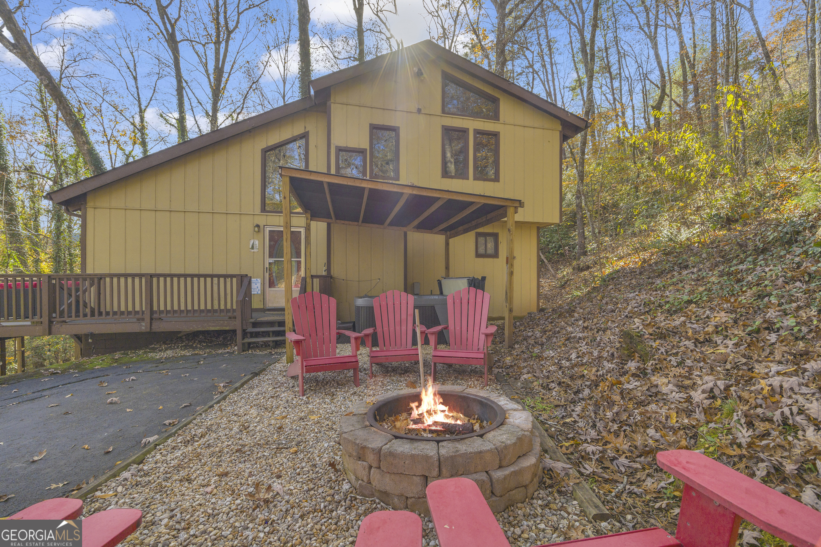 243 Ridge Road Helen, GA 30545 - Photo 8 of 82 a front view of a house with garden