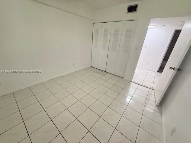 a view of a bathroom with a sink and a vanity