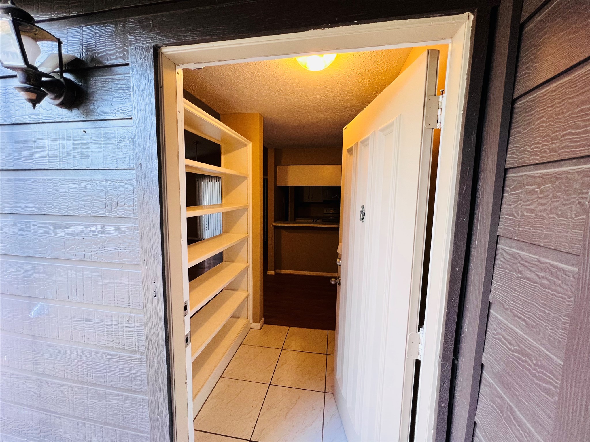 12755 Mill Ridge Drive, Unit 311 Cypress, TX 77429 - Photo 4 of 17 a view of walk in closet with empty racks