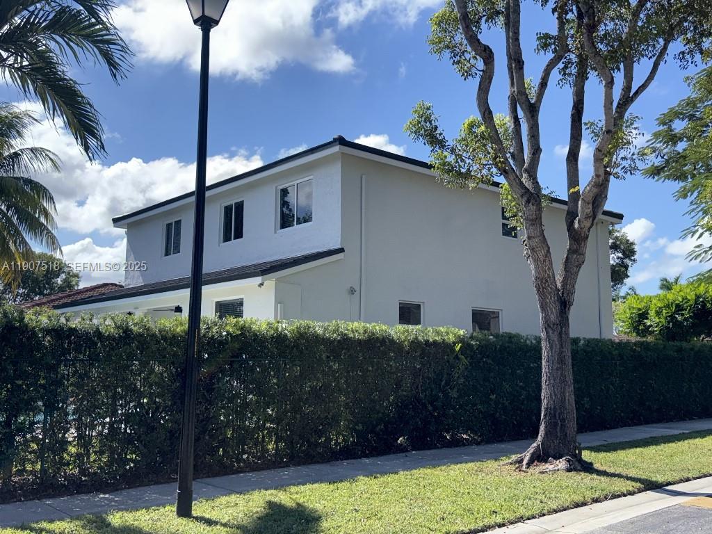 12427 Southwest 121st Avenue Miami, FL 33186 - Photo 33 of 33 a backyard of a house