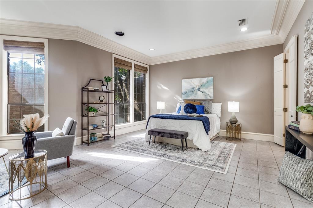 7155 Helsem Bend Circle Dallas, TX 75230 - Photo 15 of 26 a bed room with a bed and a chair