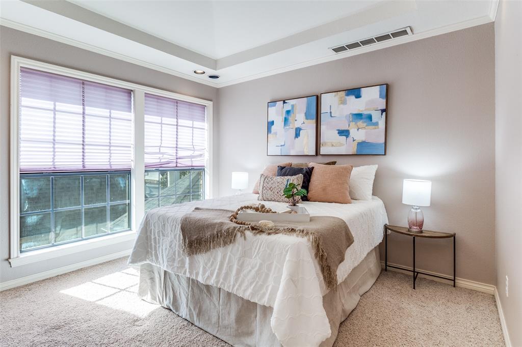 7155 Helsem Bend Circle Dallas, TX 75230 - Photo 19 of 26 a bedroom with a bed and a window