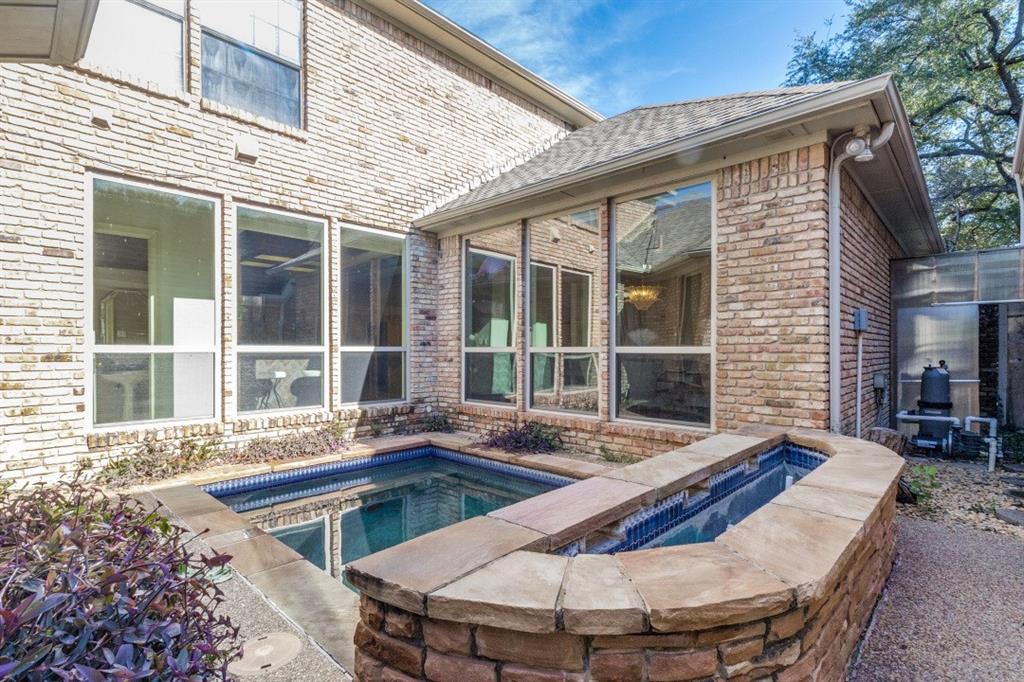 7155 Helsem Bend Circle Dallas, TX 75230 - Photo 25 of 26 a view of a house with pool and sitting area