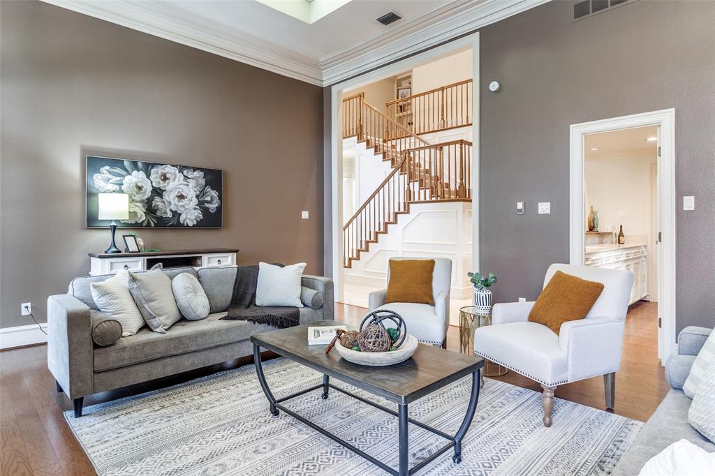 7155 Helsem Bend Circle Dallas, TX 75230 - Photo 5 of 26 a living room with furniture and a potted plant