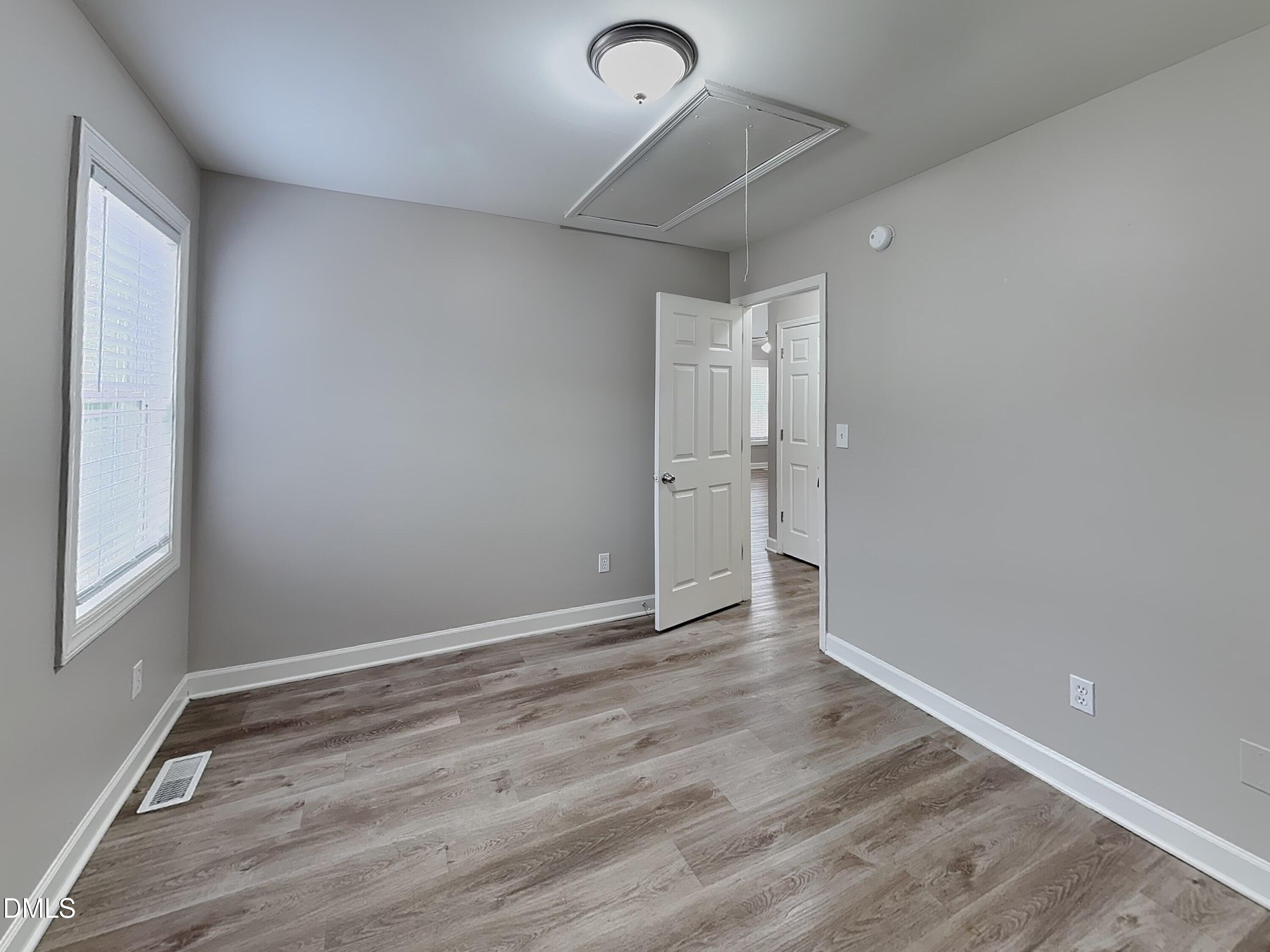 3224 Cotton Grove Raleigh, NC 27610 - Photo 11 of 15 wooden floor in an empty room