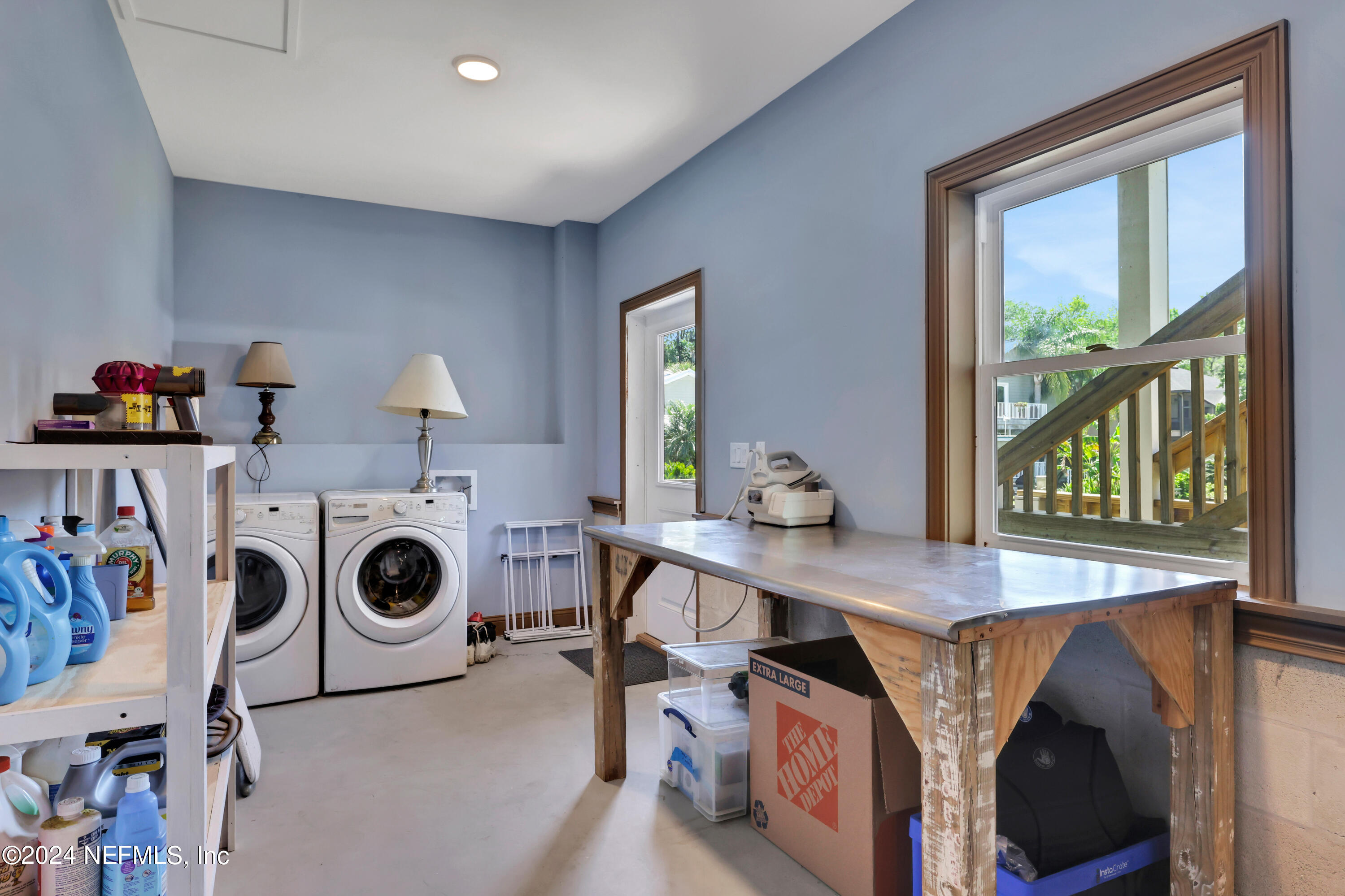 2878 Adams Road St. Augustine, FL 32092 - Photo 77 of 101 a utility room with dryer washer and a window