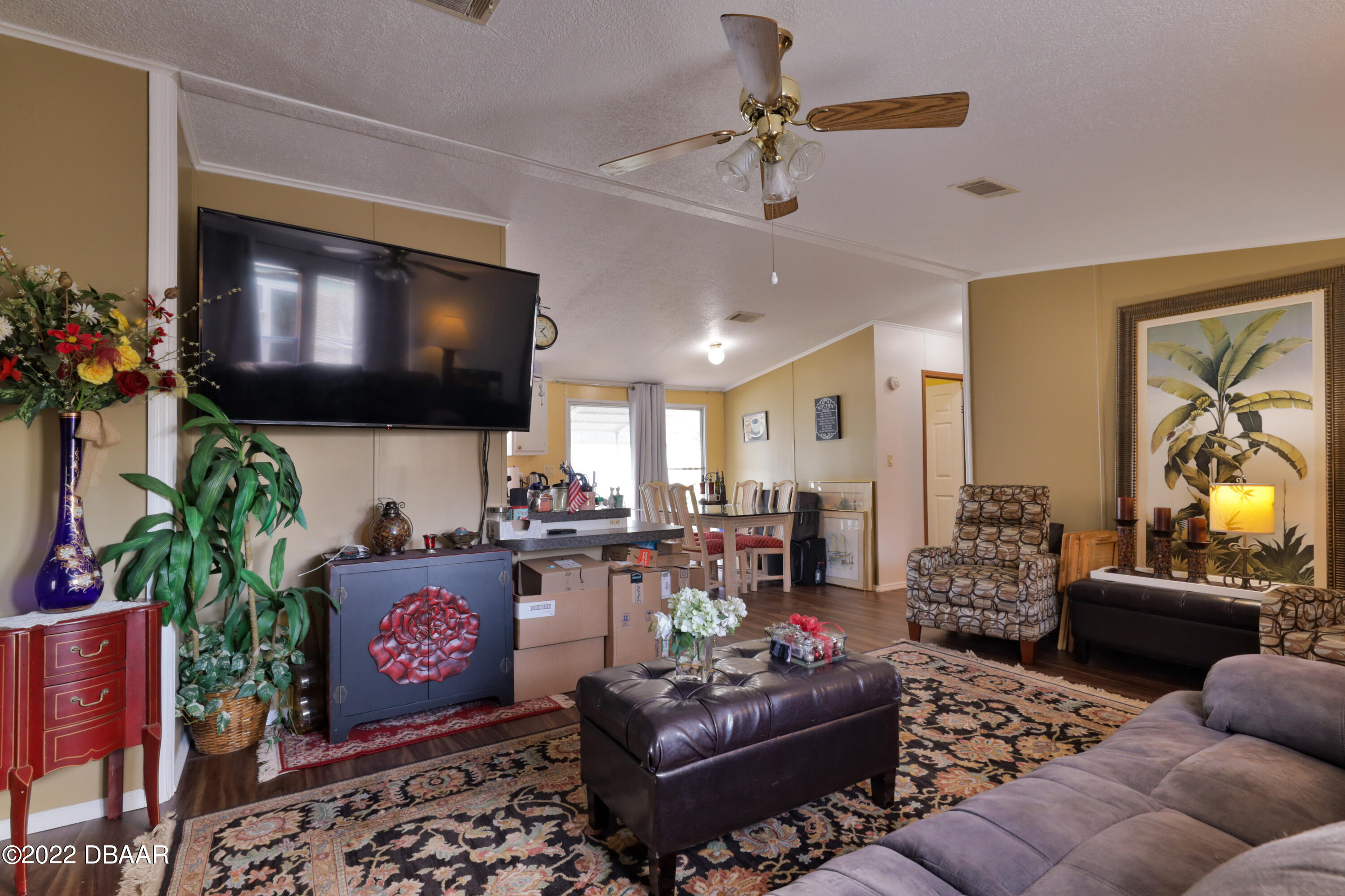 175 Coleman Street Edgewater, FL 32141 - Photo 11 of 32 a living room with furniture and a flat screen tv