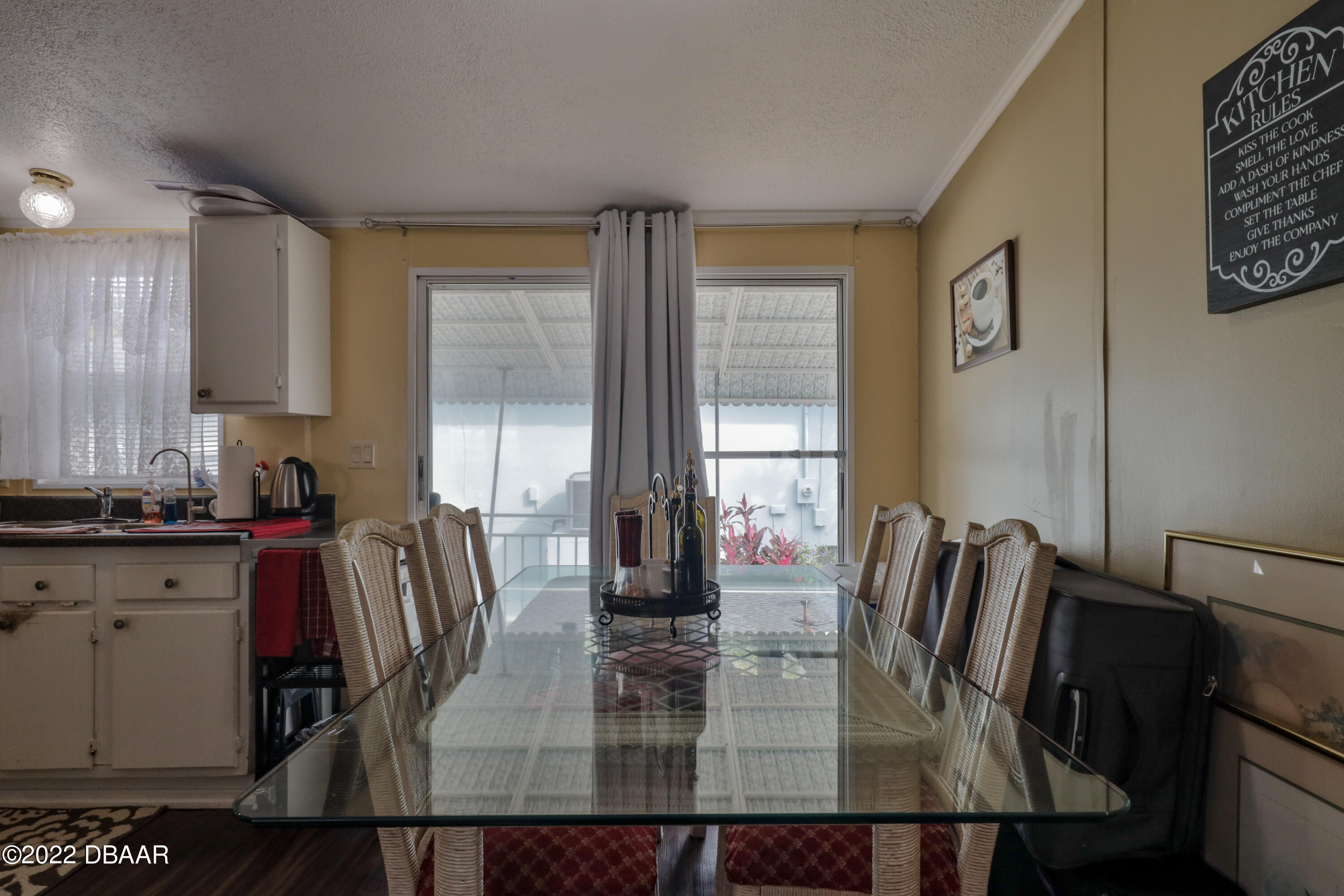 175 Coleman Street Edgewater, FL 32141 - Photo 14 of 32 a view of kitchen with kitchen island stainless steel appliances a sink and counter space
