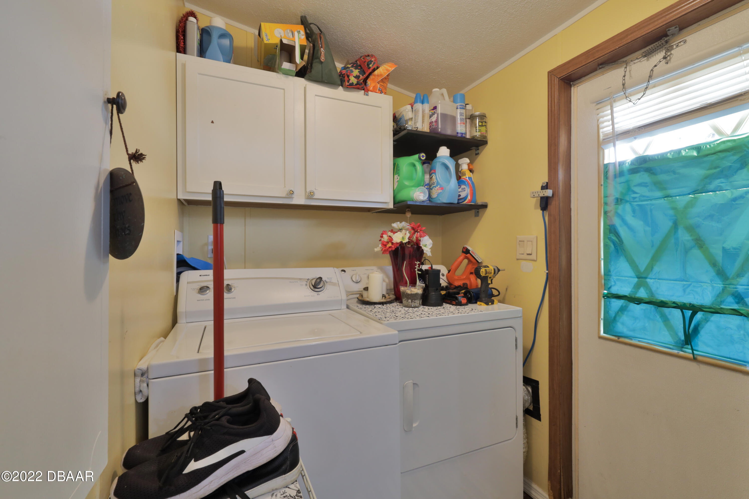 175 Coleman Street Edgewater, FL 32141 - Photo 19 of 32 a room with storage and utility