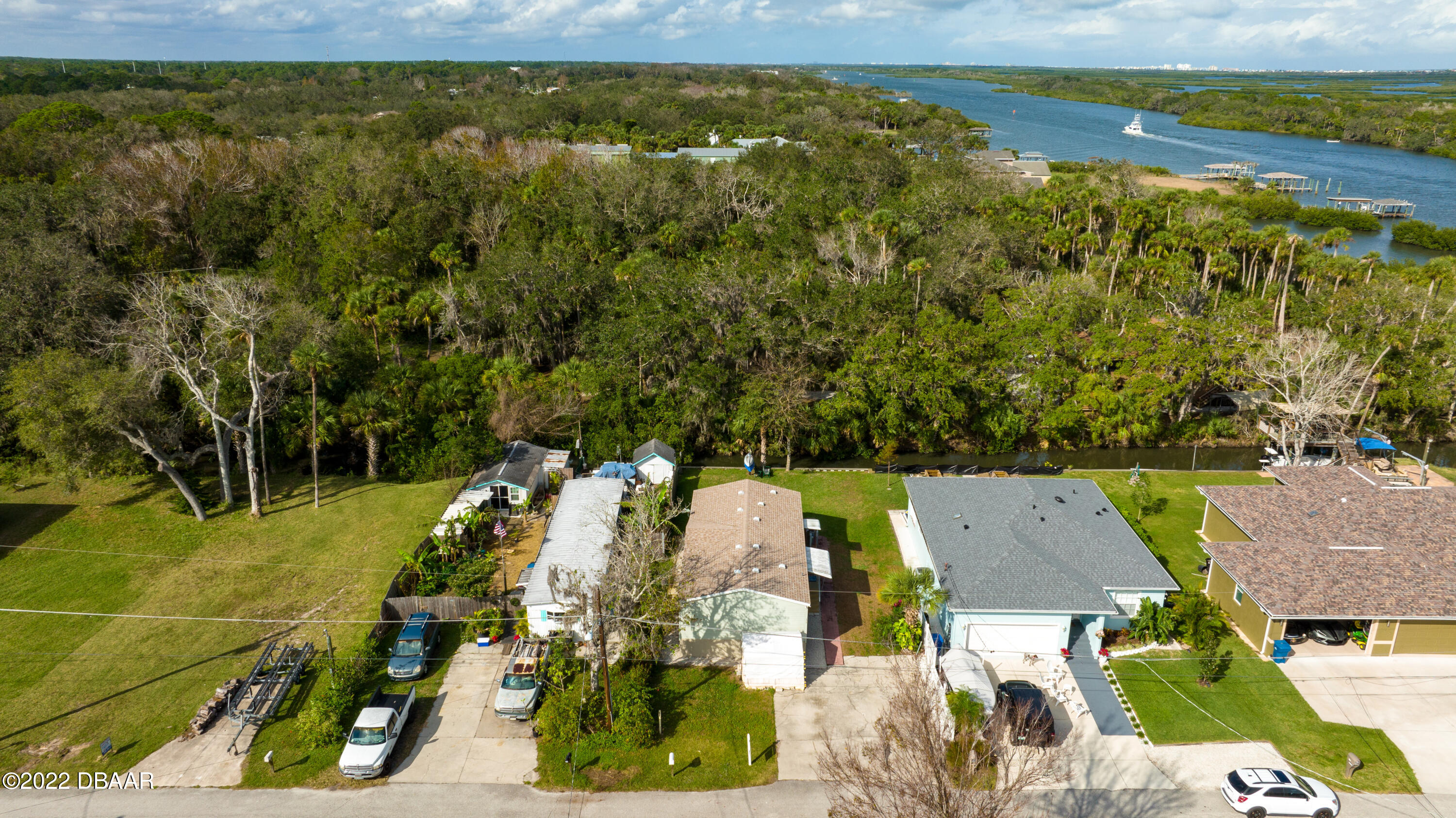 175 Coleman Street Edgewater, FL 32141 - Photo 27 of 32 an aerial view of residential houses with outdoor space