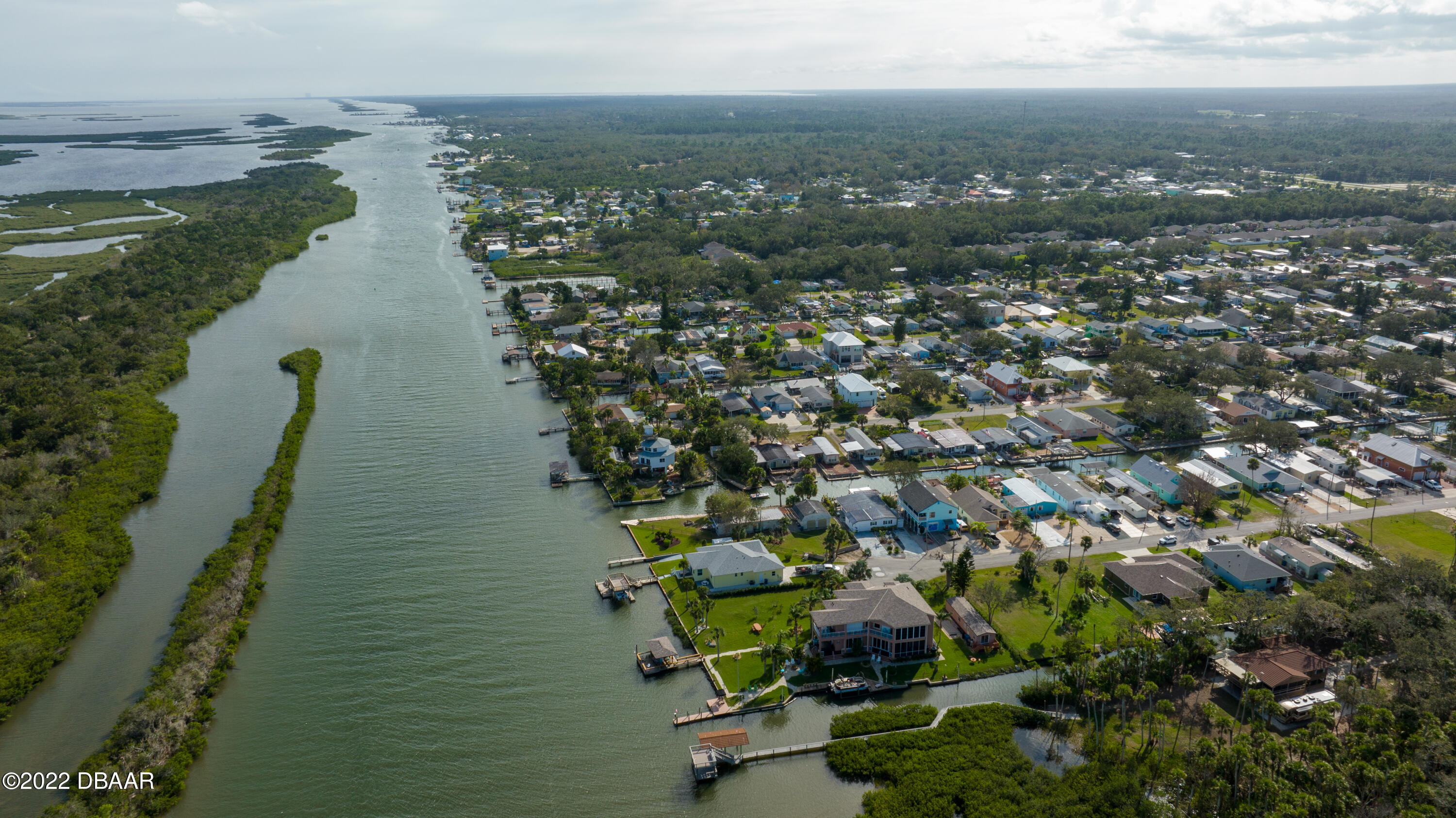 175 Coleman Street Edgewater, FL 32141 - Photo 30 of 32 an aerial view of residential houses with outdoor space